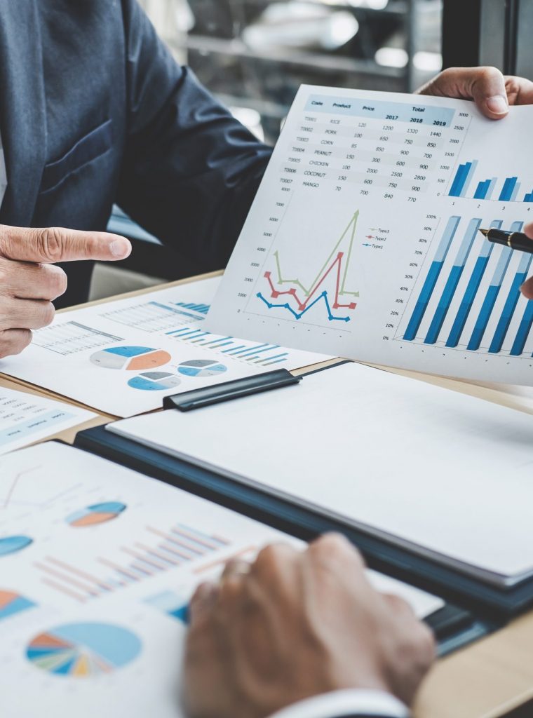 Two executive discussing company growth project success financia Two executive discussing company growth project success financial statistics, Partner meeting professional investor working start up project for both company with document, laptop and digital tablet.
